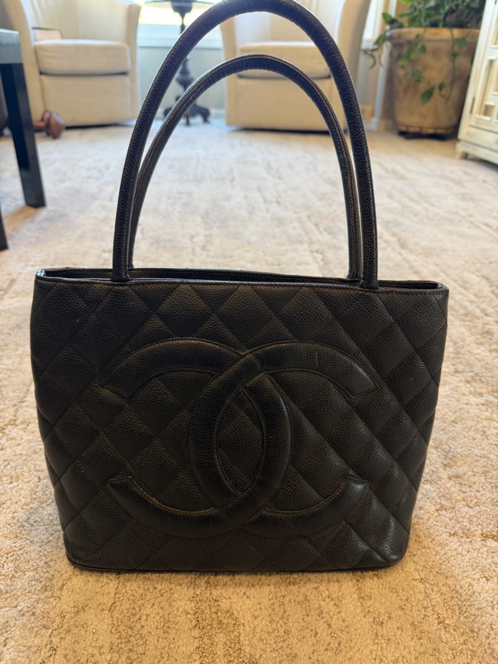 CHANEL Black Quilted Leather Tote with Interlocking CC Emblem